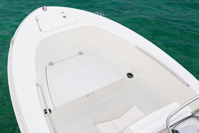 Slide: The Image of Manufacturer Provided Image: 2016 Robalo R180 Center Console boat bow area on clear water. - 9