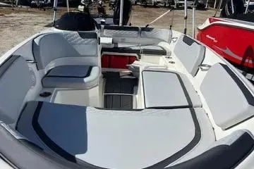 Slide: The Image of 2024 Bayliner Element M15 boat interior with spacious seating and modern design. - 6