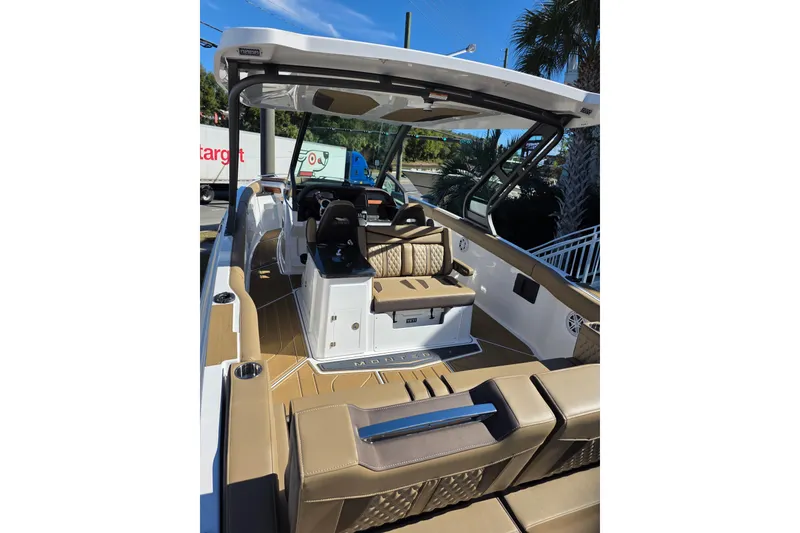 Slide: The Image of 2026 Monterey Elite 30 OB boat interior with luxurious seating and modern design. - 8