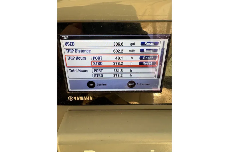 Slide: The Image of Yamaha display showing trip data for 2024 Grady-White Canyon 306 boat. - 11