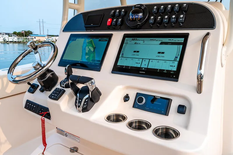 Slide: The Image of Manufacturer Provided Image: 2024 Grady-White Canyon 306 boat dashboard with advanced navigation and control systems. - 5