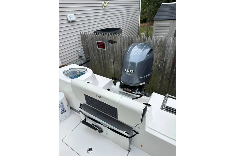 Slide: The Image of 2022 Tidewater 210 CC Adventure boat with Yamaha 150 outboard motor. - 2