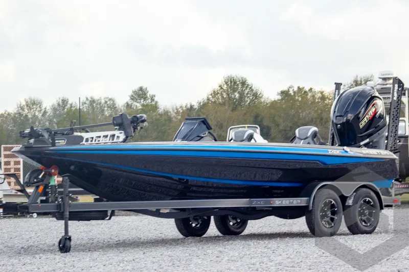 The Image of 2026 Skeeter ZXE21 boat with sleek design and powerful engine on a trailer. - 1