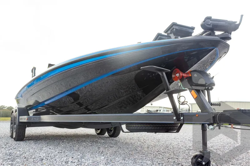 Slide: The Image of 2026 Skeeter ZXE21 boat on trailer, showcasing sleek design and modern features. - 10