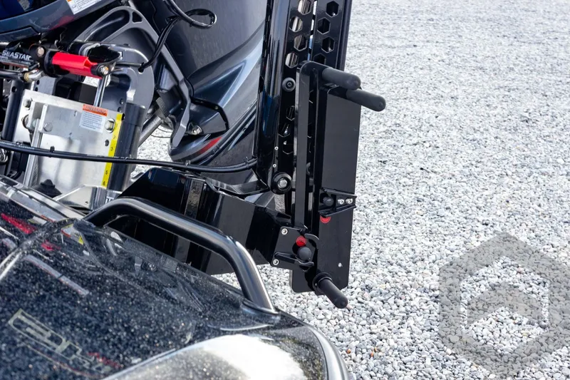 Slide: The Image of 2026 Skeeter ZXE21 boat motor mount on gravel surface. - 22