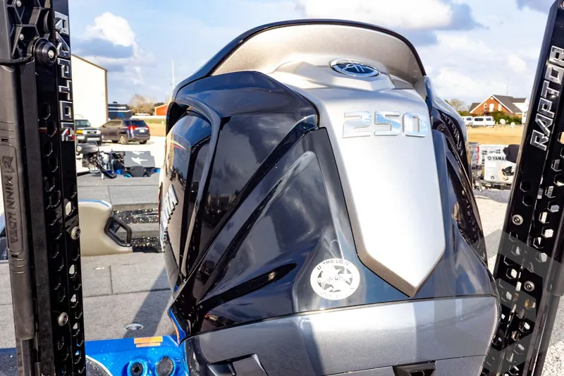 Slide: The Image of 2026 Skeeter ZXE21 boat engine with 250 horsepower, displayed outdoors. - 25