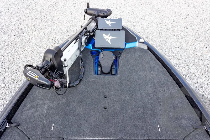 Slide: The Image of 2026 Skeeter ZXE21 boat deck with trolling motor and control panels. - 39