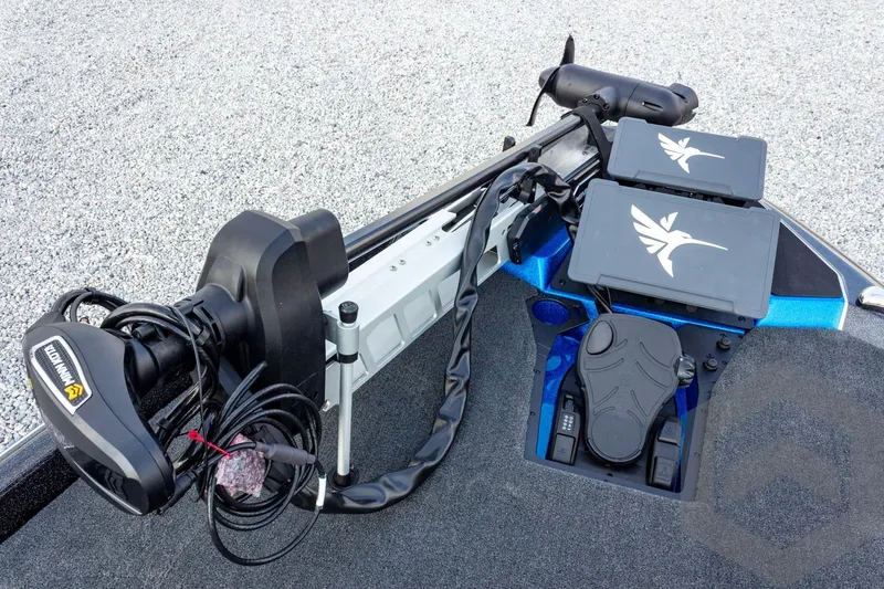 Slide: The Image of 2026 Skeeter ZXE21 boat deck with trolling motor and control panels. - 42