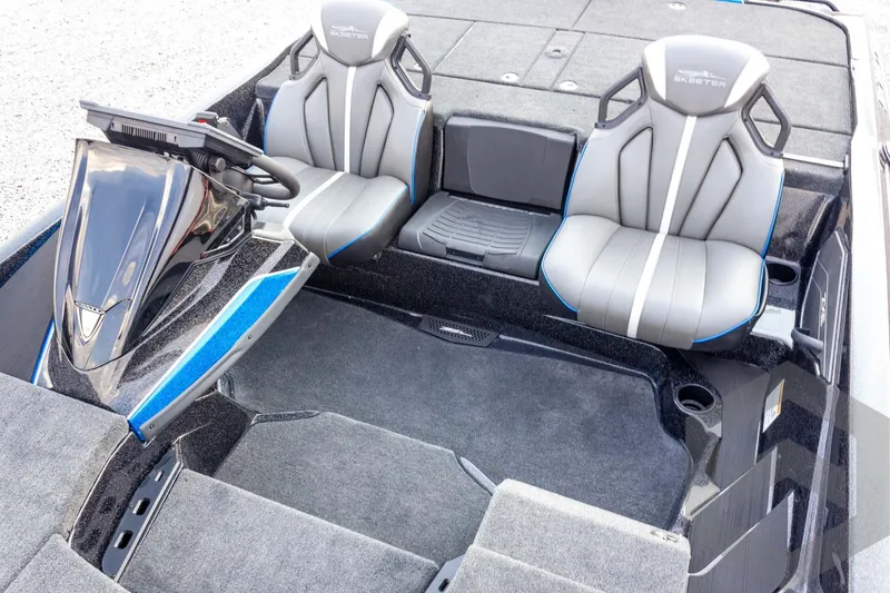 Slide: The Image of 2026 Skeeter ZXE21 boat interior with dual seats and modern dashboard design. - 43