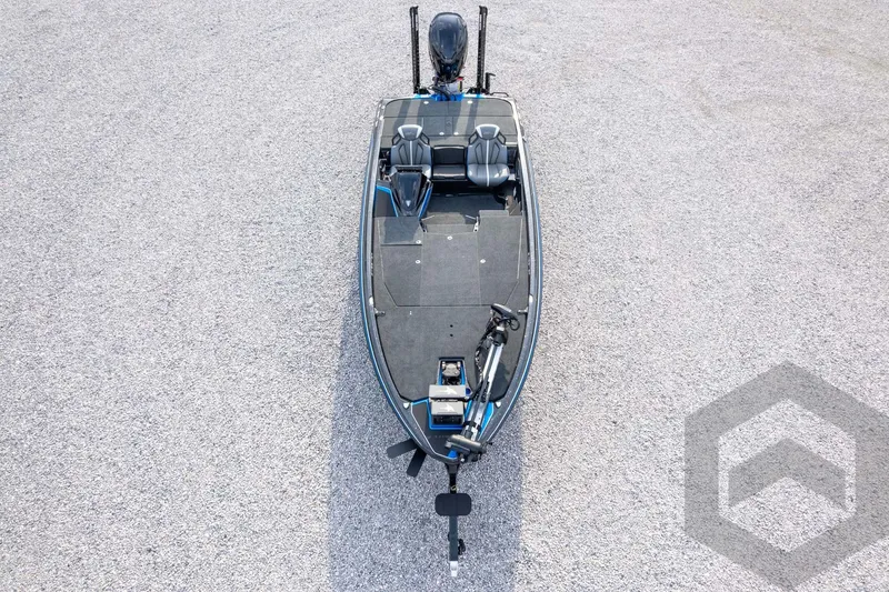 Slide: The Image of 2026 Skeeter ZXE21 fishing boat, aerial view on gravel surface, showcasing seating and deck layout. - 59