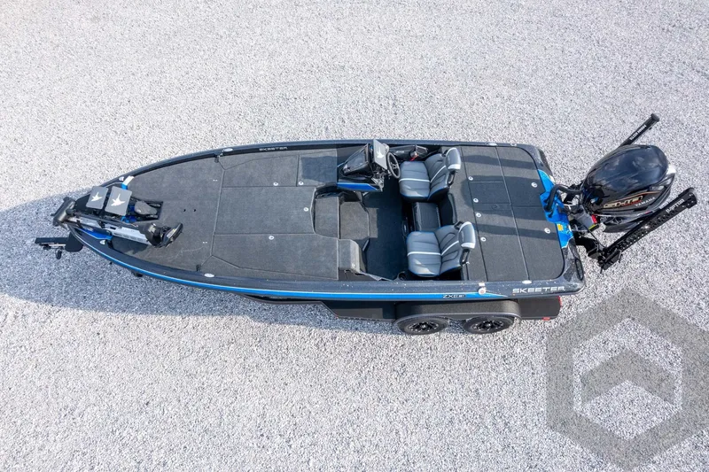 Slide: The Image of 2026 Skeeter ZXE21 boat, aerial view, sleek design, dual seats, powerful outboard motor. - 61
