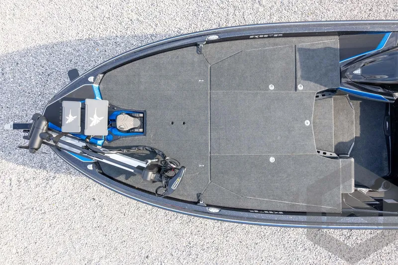 Slide: The Image of Top view of 2026 Skeeter ZXE21 boat deck with trolling motor and storage compartments. - 68