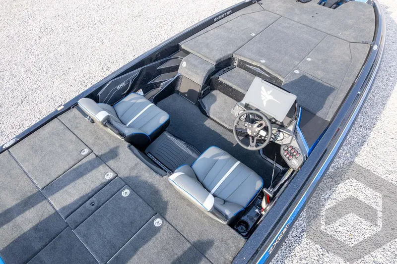 Slide: The Image of 2026 Skeeter ZXE21 boat interior with dual seats and modern dashboard. - 70