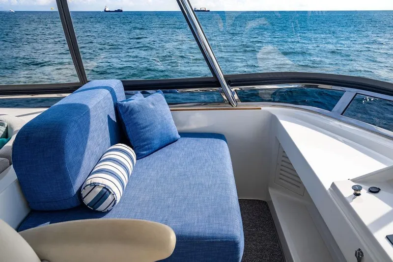 Slide: The Image of Luxurious Lanzarote Ventuno 73 yacht interior with blue seating, ocean view, 2013 model. - 31