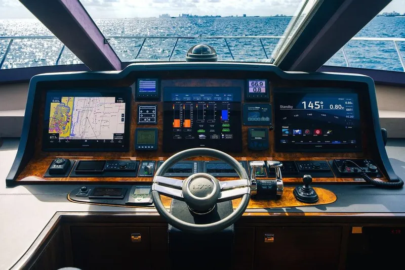 Slide: The Image of Cockpit of 2013 Lanzarote Ventuno 73 yacht with navigation screens and steering wheel. - 55