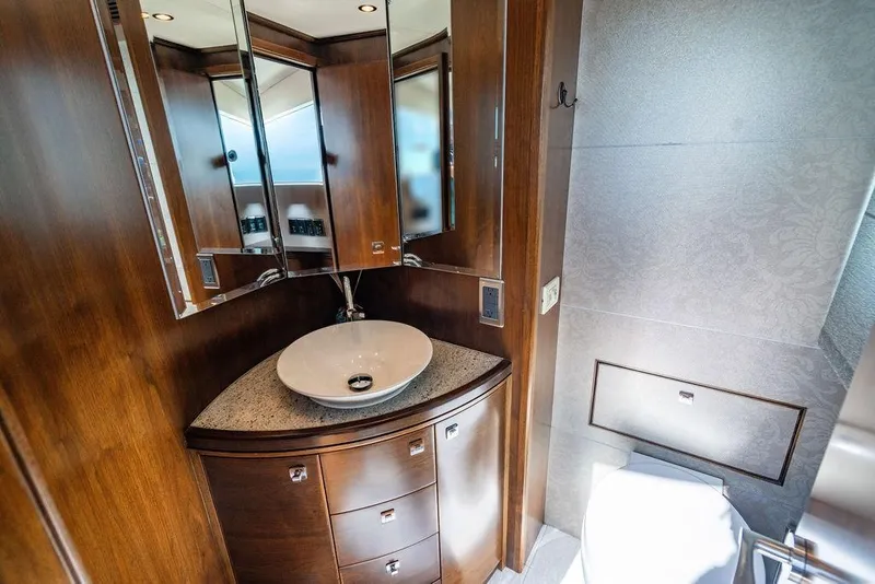 Slide: The Image of Luxurious bathroom in 2013 Lanzarote Ventuno 73 yacht with elegant wood finish. - 62