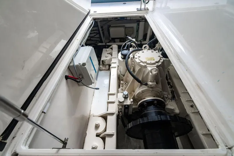 Slide: The Image of Engine compartment of 2013 Lanzarote Ventuno 73, showcasing mechanical components and wiring. - 85