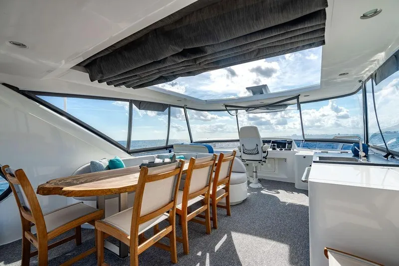 Slide: The Image of Luxurious interior of 2013 Lanzarote Ventuno 73 yacht with ocean view and elegant seating. - 34