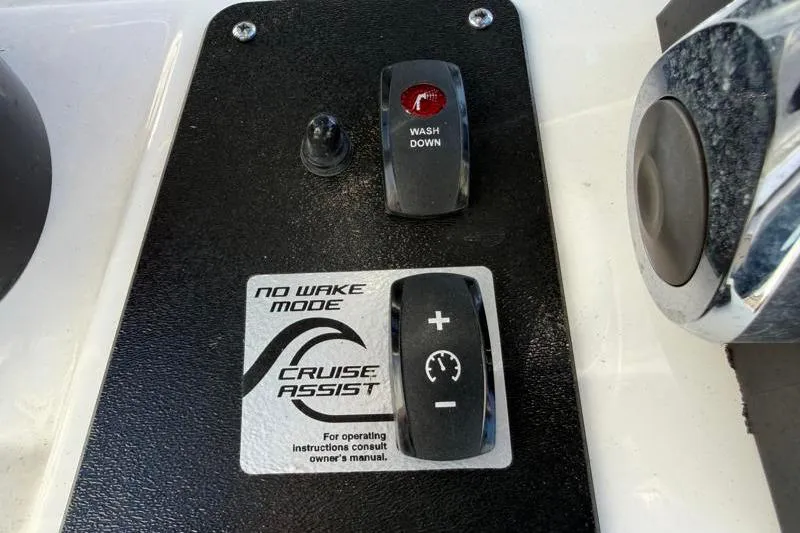 Slide: The Image of 2024 Yamaha Boats 222 FSH Sport control panel with Cruise Assist and No Wake Mode features. - 32