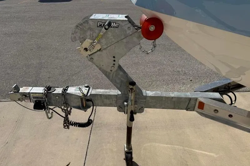 Slide: The Image of Trailer hitch of 2024 Yamaha Boats 222 FSH Sport, featuring a Prolite winch system. - 44