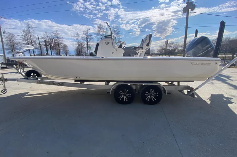 Slide: The Image of 2023 Tidewater 2410 Bay Max boat on trailer with Yamaha outboard motor. - 8