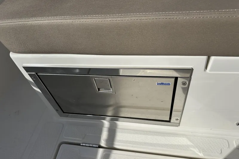 Slide: The Image of 2024 Nimbus T-8 boat interior with Isotherm stainless steel compartment. - 4