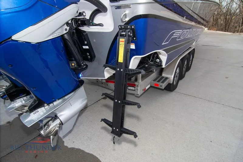 Slide: The Image of Simrad display on 2022 Fountain 38 SC showing engine metrics and navigation data. - 11