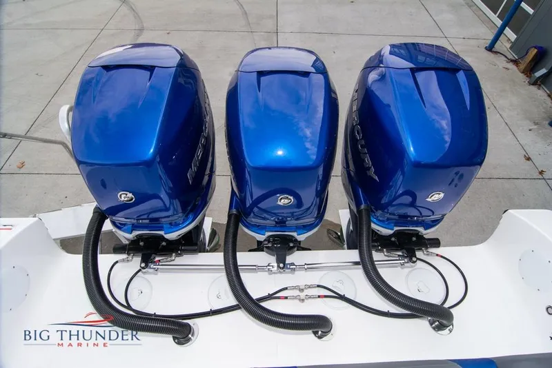 Slide: The Image of 2022 Fountain 38 SC boat interior with luxurious seating and blue LED lighting. - 15