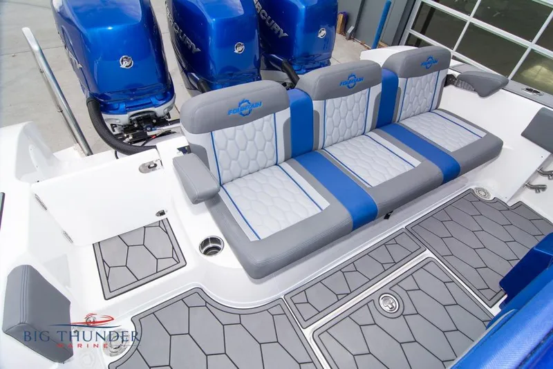 Slide: The Image of 2022 Fountain 38 SC boat interior with luxurious seating and multiple outboard engines. - 18