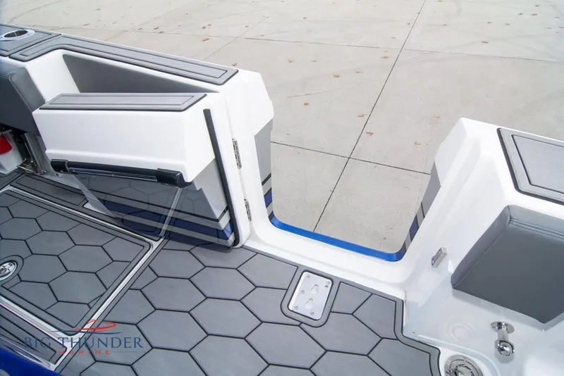 Slide: The Image of 2022 Fountain 38 SC boat interior with modern dashboard and seating. - 22