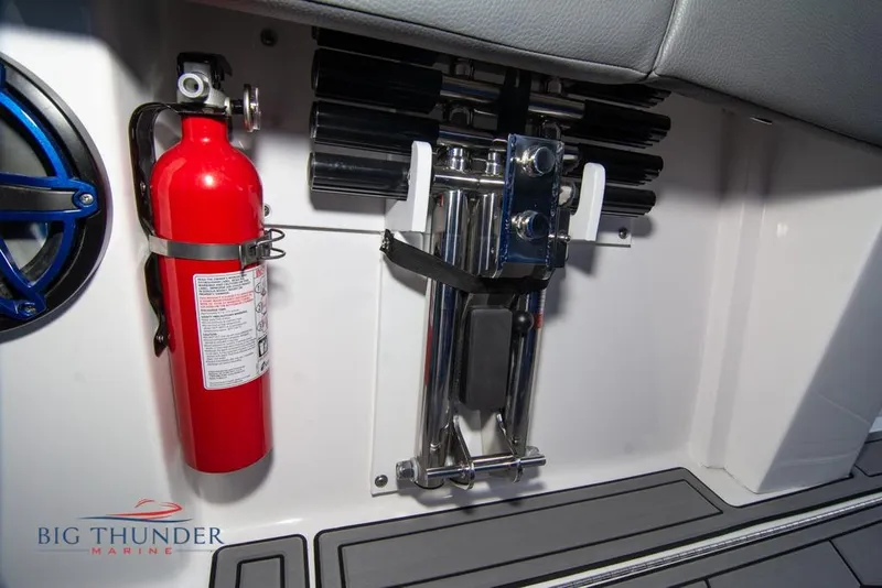 Slide: The Image of Interior of 2022 Fountain 38 SC boat with blue seating and modern dashboard. - 23