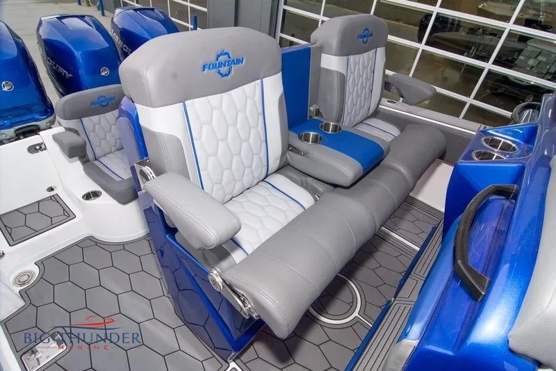 Slide: The Image of 2022 Fountain 38 SC boat dashboard with advanced navigation and control systems. - 26