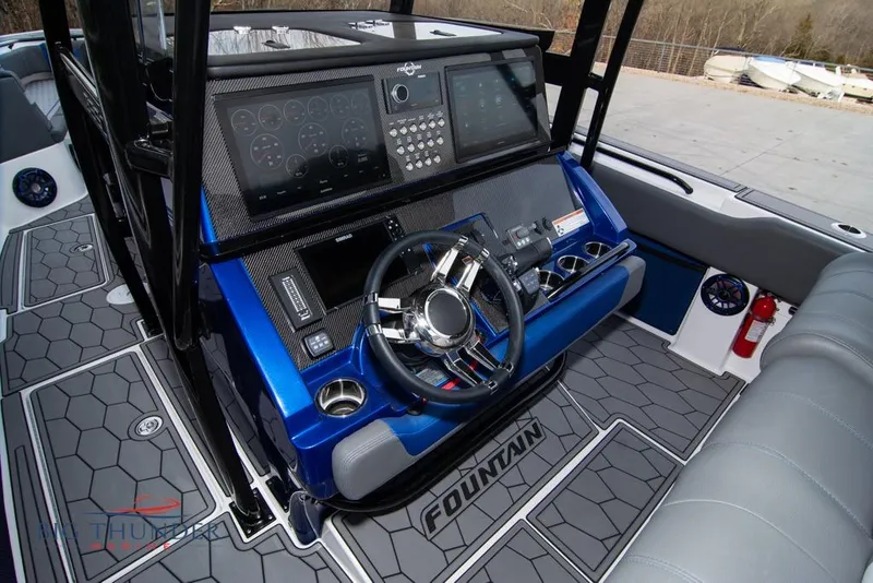 Slide: The Image of Control panel and porthole inside 2022 Fountain 38 SC boat cabin. - 32