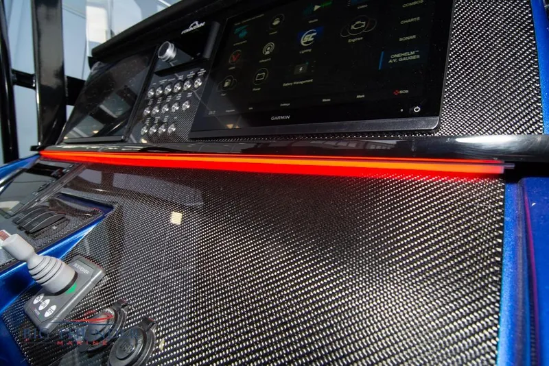 Slide: The Image of Electrical system inside a 2022 Fountain 38 SC boat, featuring various components and wiring. - 38