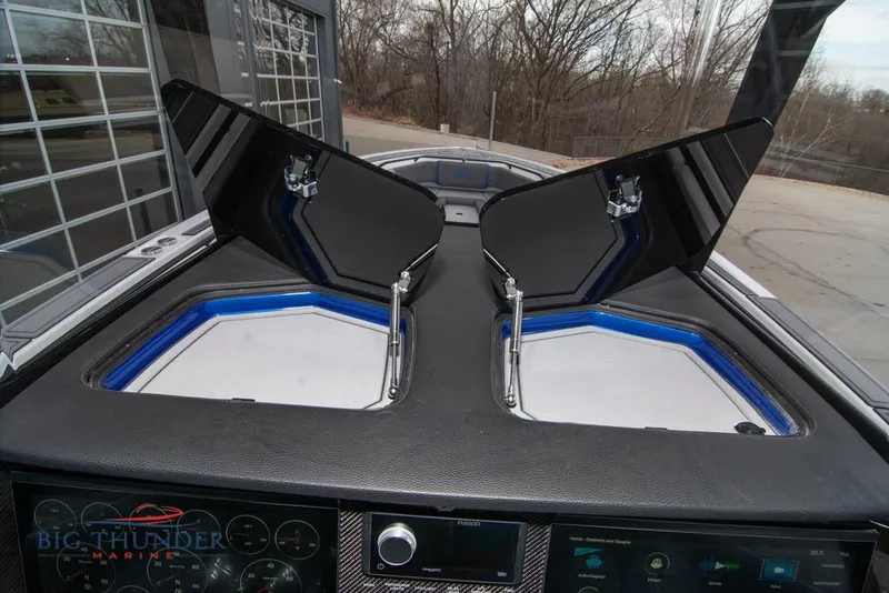 Slide: The Image of Electrical wiring and components inside a 2022 Fountain 38 SC boat. - 39