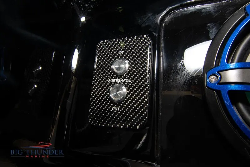 Slide: The Image of 2022 Fountain 38 SC boat interior with blue LED lighting in showroom. - 44