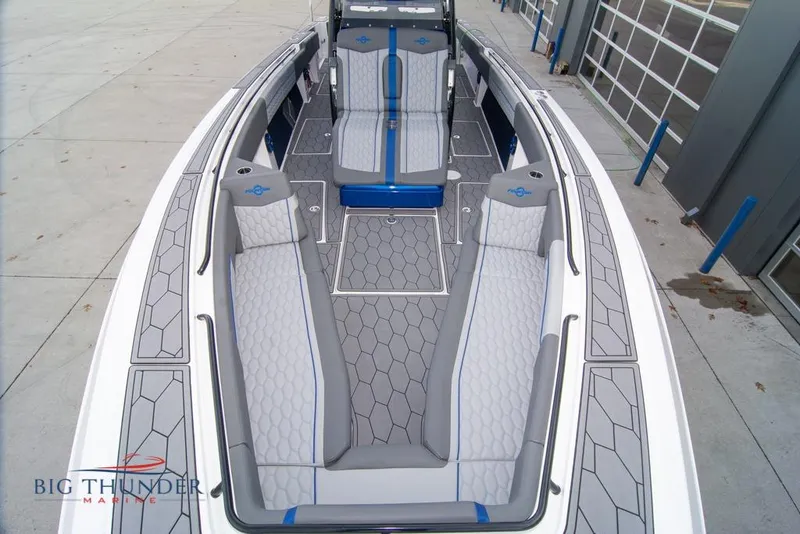 Slide: The Image of 2022 Fountain 38 SC boat dashboard with advanced navigation and control systems. - 51
