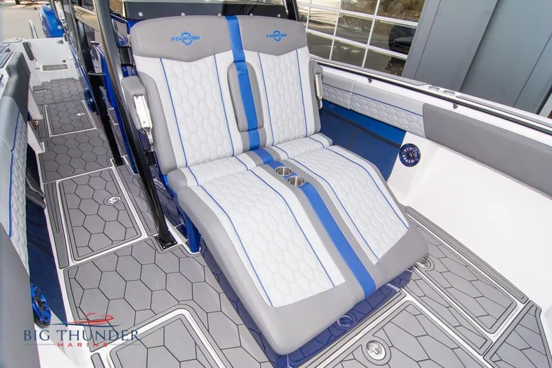 Slide: The Image of 2022 Fountain 38 SC boat dashboard with advanced navigation and control systems. - 53