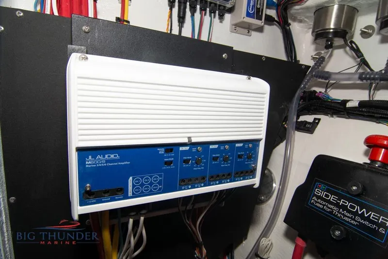 Slide: The Image of 2022 Fountain 38 SC boat interior with advanced navigation system and luxurious seating. - 61