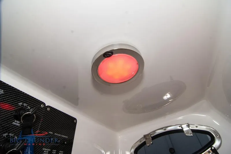 Slide: The Image of 2022 Fountain 38 SC boat interior with advanced navigation system and modern design. - 63