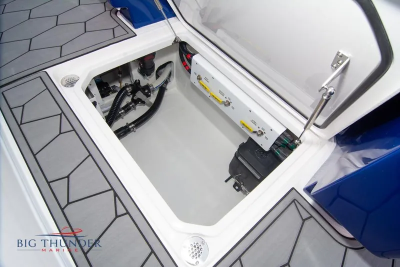 Slide: The Image of 2022 Fountain 38 SC boat interior with blue LED lighting and cushioned seating. - 65