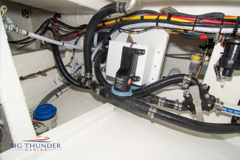 Slide: The Image of 2022 Fountain 38 SC boat interior with open storage compartment and modern flooring design. - 67