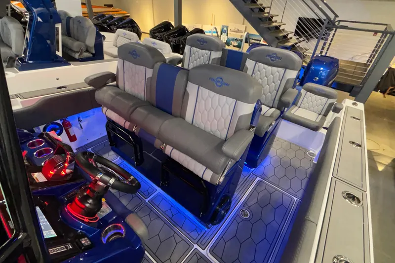 Slide: The Image of 2022 Fountain 38 SC boat interior with modern seating and illuminated controls. - 86
