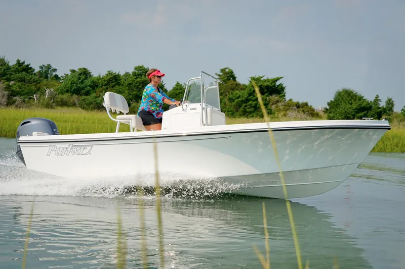 Slide: The Image of Manufacturer Provided Image: 2017 Parker 1801 Center Console boat cruising on a calm waterway. - 11