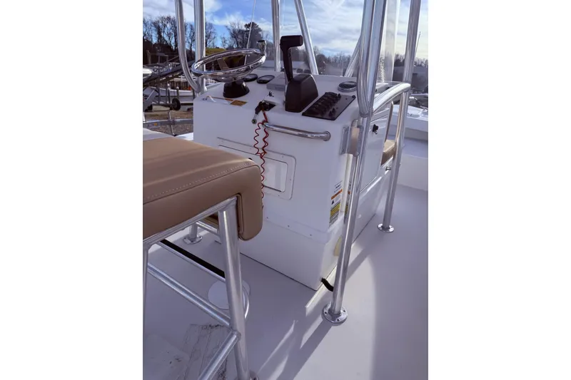 Slide: The Image of 2017 Parker 1801 Center Console boat interior with steering wheel and controls. - 4
