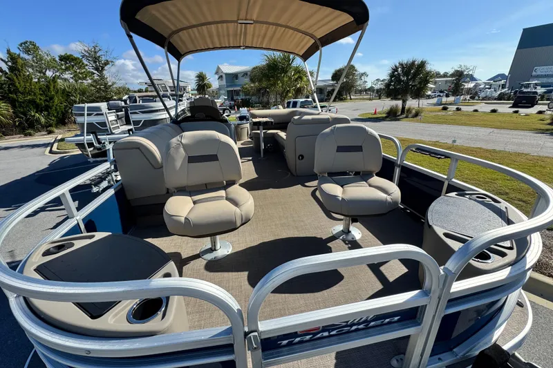 Slide: The Image of 2023 Sun Tracker Fishin' Barge 20 DLX pontoon boat with seating and canopy. - 10