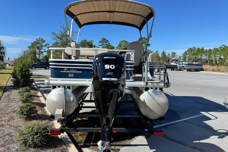 Slide: The Image of 2023 Sun Tracker Fishin' Barge 20 DLX pontoon boat with Mercury 90 engine in parking lot. - 6