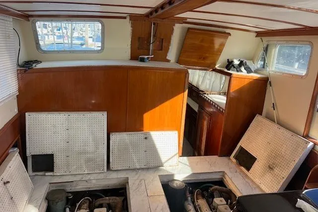 Slide: The Image of Interior of 1985 Sunnfjord 40 boat with engine access panels removed. - 20