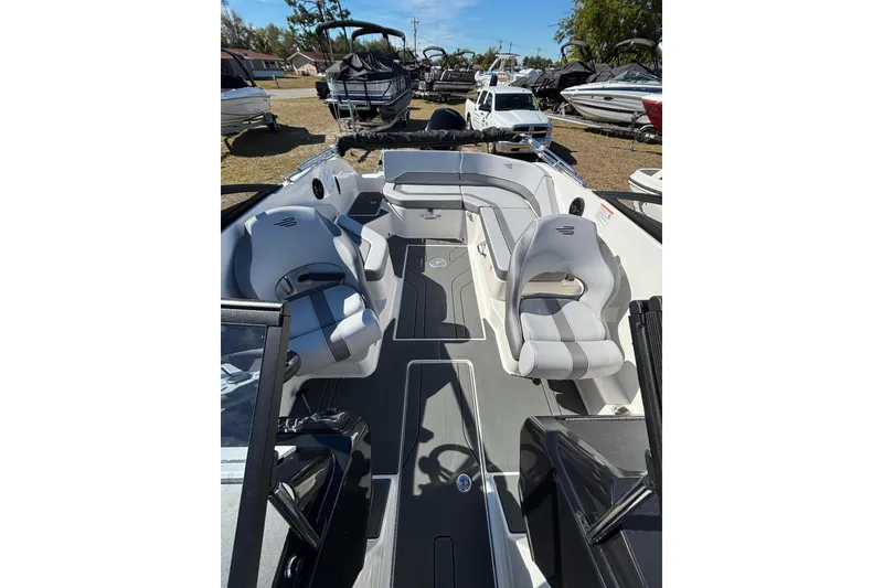 Slide: The Image of 2026 Bayliner V20 boat interior with modern seating and sleek design. - 18
