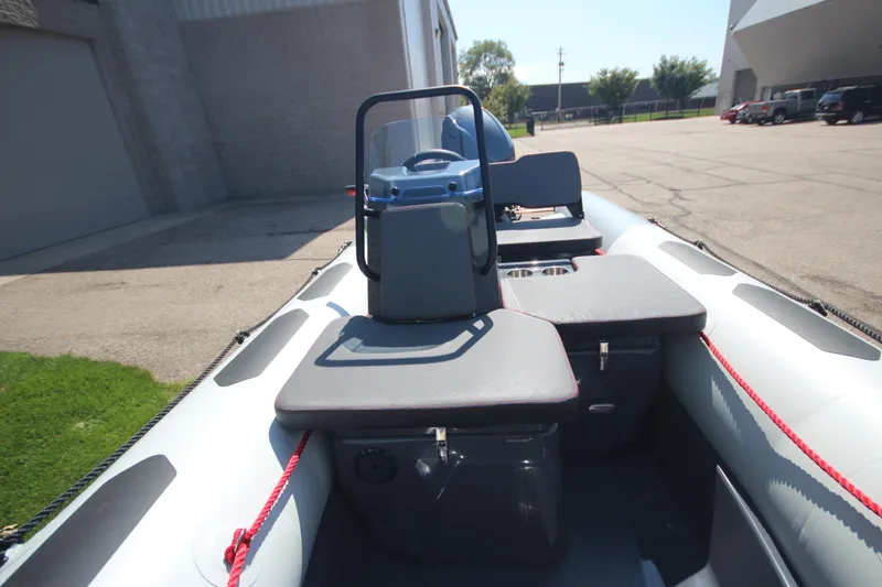 Slide: The Image of Zodiac Open 4.2 NEO 50hp boat, 2026 model, parked outdoors. - 10